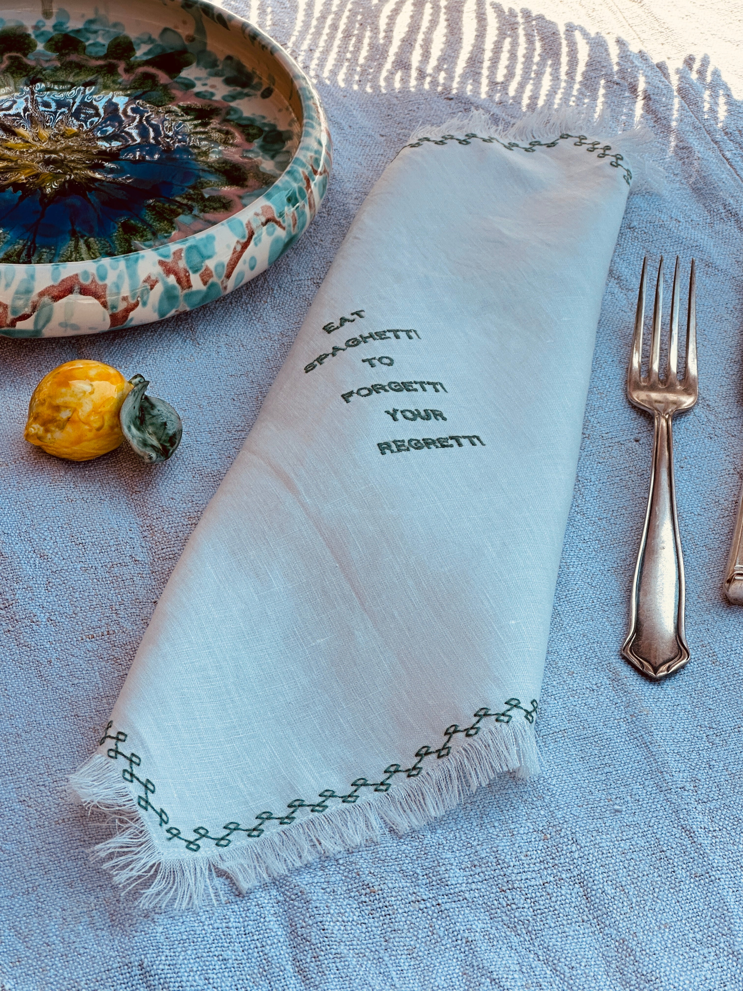 Light Linen Napkin "Eat Spaghetti to forget your Regretti"